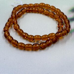 5x4mm, Premium Czech Glass, Oval, Smokey Topaz, 25 Beads