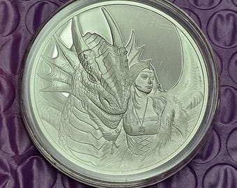 Almas Gemelas: 1 oz; Moneda redonda de plata pura .999 con acabado de prueba.