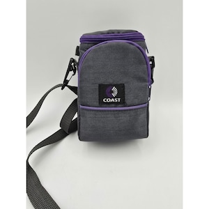 May include: A gray and purple COAST shoulder bag with a black strap. The bag has a zippered top and a front pocket with the COAST logo. The bag is designed to carry small items.