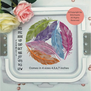 May include: Five colorful embroidered feathers in a circular design, with the text "Comes in 4 sizes 4,5,6,7 inches" below. The embroidery design is in a white embroidery hoop.