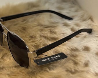 Gafas de sol con montura dorada para hombre