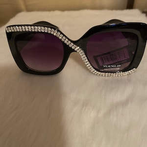 Black Sunglasses with a Bling