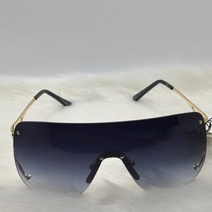 Blue tinted  Rimless Sunglasses unisex