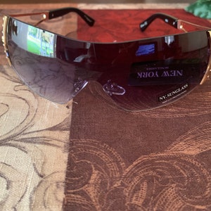 Gold frame square sunglasses