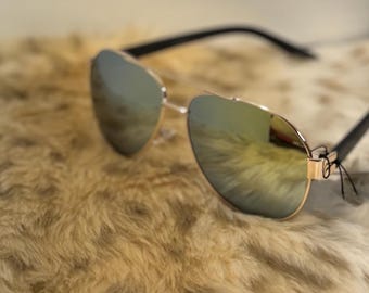 Gafas de sol con montura dorada para hombre