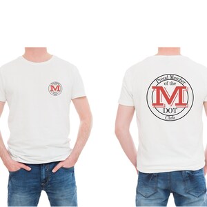 May include: A white short-sleeved t-shirt featuring a circular logo on the left chest and a larger version on the back. The logo contains the text "Proud Member of the M DOT Club" in black lettering surrounding a large red letter M.