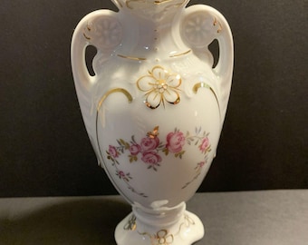 Jarrón de porcelana Royal Dux con rosas rosas y doble asa con detalles dorados, Checoslovaquia