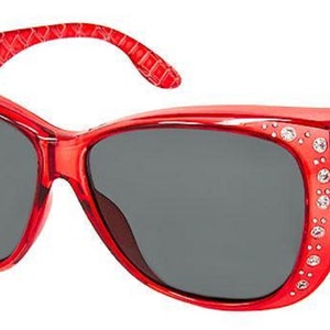May include: Red cat-eye sunglasses with rhinestones on the frame and gray lenses.