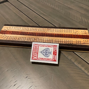 Handmade hardwood 3 lane cribbage board with peg storage. Great gift for Father’s Day, Birthday, Anniversary or Just Because