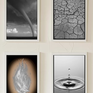 May include: Four framed black and white photographs on a white wall. The top left photo shows a tornado in the sky. The top right photo shows cracked earth. The bottom left photo shows a stylized image of a flame. The bottom right photo shows a water drop falling into a pool of water.