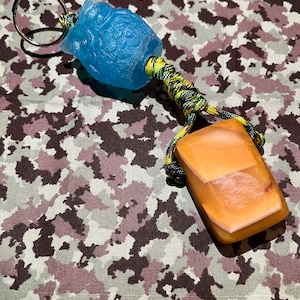 Stabilized wood and leather / mixed resin composite worry stone with lanyard and glow bead