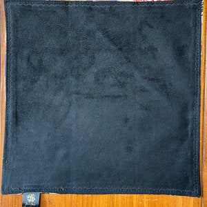 May include: Black velvet dice tray with a colorful floral pattern border. The tray has a label on the bottom that reads "Dice Tray by Oh Sew Crafty".