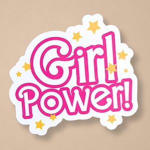 May include: White sticker with pink lettering that says "Girl! Power!" surrounded by yellow stars.