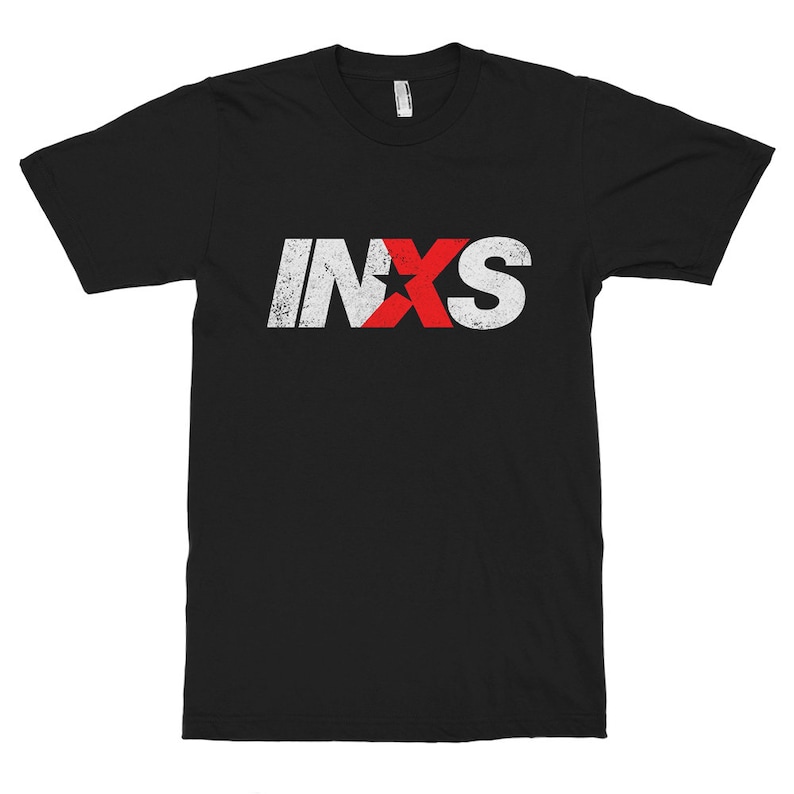 May include: Black t-shirt with a white and red "INXS" logo. The "X" is a red star.