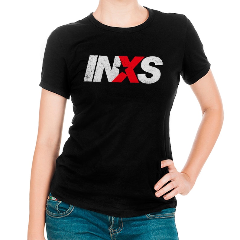 May include: Black t-shirt with a white and red distressed graphic of the band INXS.