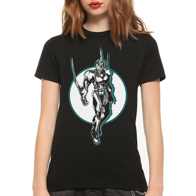 May include: Black t-shirt with a white graphic of a character in a helmet and armor, standing in a circle with a teal outline.