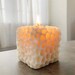 Honeycomb Candle, with a line of different fragrances to choose from, & available in multiple colours. 
