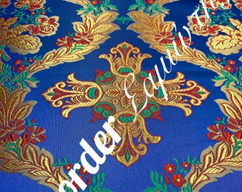 May include: Blue fabric with a gold and red cross pattern. The fabric has a repeating pattern of crosses and floral designs.