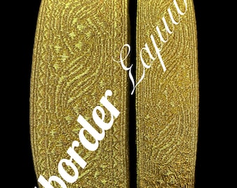 May include: Two rolls of gold metallic trim with a textured pattern. The trim is labeled "Artborder & Equipments".