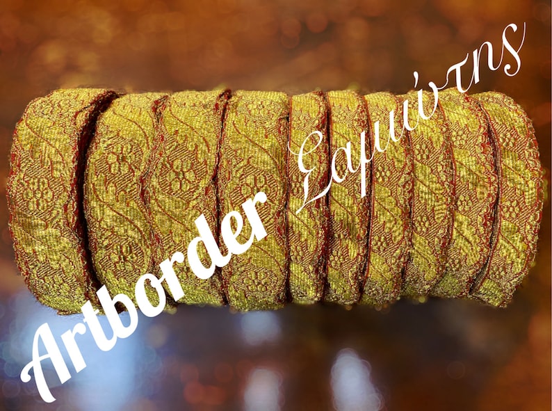 May include: A roll of gold and red trim with a floral pattern. The trim is approximately 1 inch wide.