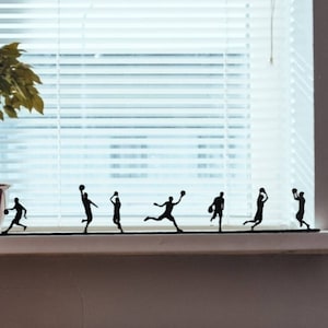 Basketball Player Silhouette Ornament made from plant based plastic