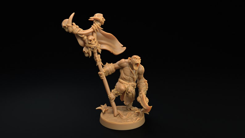 May include: A brown plastic miniature figurine of an Orc warrior holding a staff with a skull and a banner. The Orc is wearing a loincloth and has a fierce expression on its face.