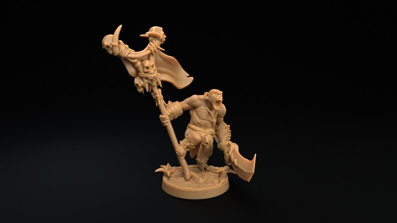 May include: A brown plastic miniature figurine of an Orc warrior holding a large axe and a staff with a skull and a banner. The Orc is wearing a loincloth and has a fierce expression on its face.