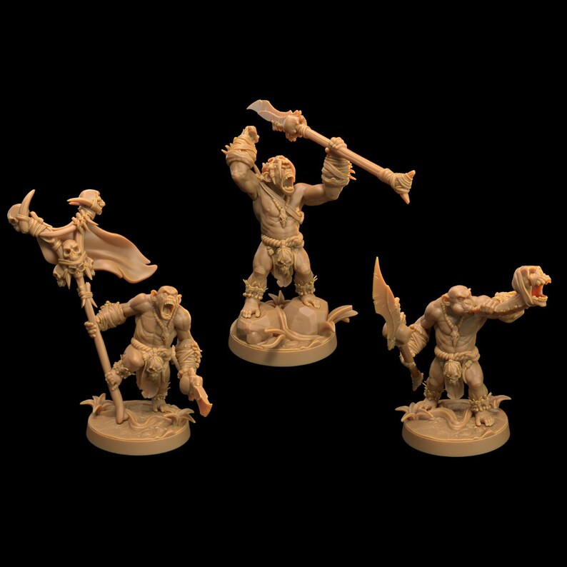 May include: Three miniature plastic figures of orcs, each holding a different weapon. The orcs are painted in a brown color and are standing on circular bases.