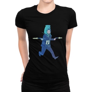 May include: Black t-shirt with a graphic of a man running with a dog on his shoulders, both holding guns. The man is wearing a suit and the dog is blue.
