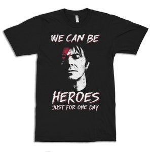 May include: Black t-shirt with a white graphic of David Bowie with the text "We can be heroes just for one day".