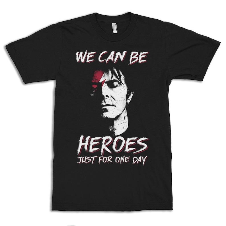 May include: Black t-shirt with a white graphic of David Bowie with the text "We can be heroes just for one day".