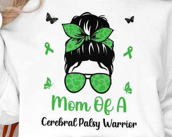 May include: White sweatshirt with a green and black graphic of a woman with a bun and sunglasses. The text "Mom of a Cerebral Palsy Warrior" is printed below the graphic.