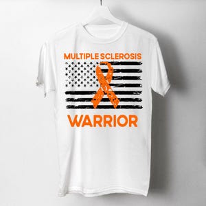 May include: White t-shirt with an orange ribbon and an American flag design. The text "Multiple Sclerosis Warrior" is printed on the shirt.