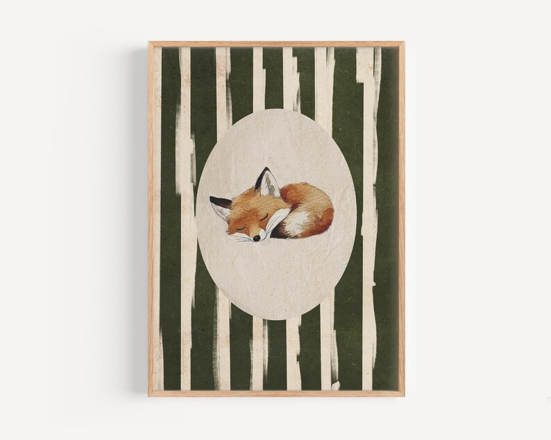 May include: A framed art print featuring a sleeping fox illustration. The fox is depicted in shades of orange, brown, and white, curled up inside an oval shape. The background has vertical green and white stripes.