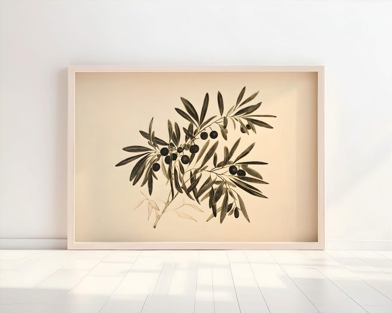 May include: A framed print of a black and white illustration of an olive branch with olives on a beige background.