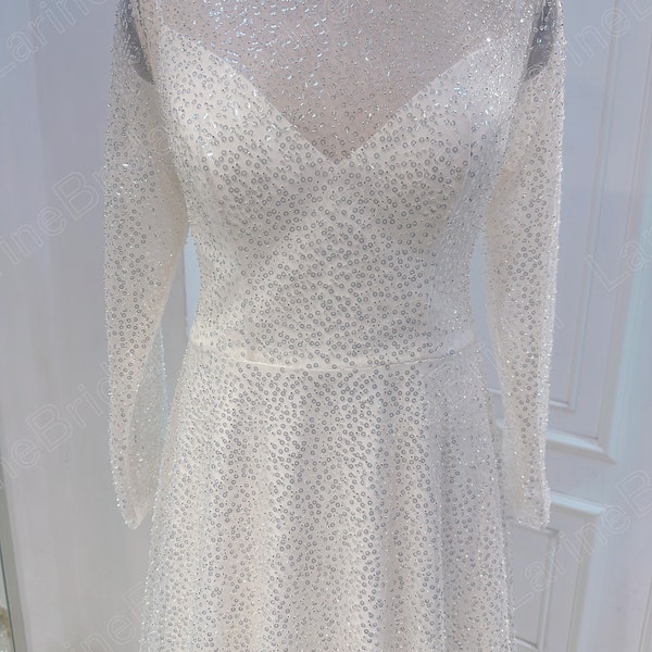 Sparkling wedding dress. Long sleeve A line wedding dress. Custom wedding dress for the bride.