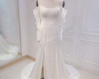 Custom wedding dresses. Crepe wedding dress with pearls. Wedding dress with thigh slit.