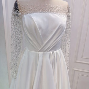 Beaded long sleeve A line wedding dress. Elegant beach wedding dress. Custom made wedding dress. Custom wedding dress.