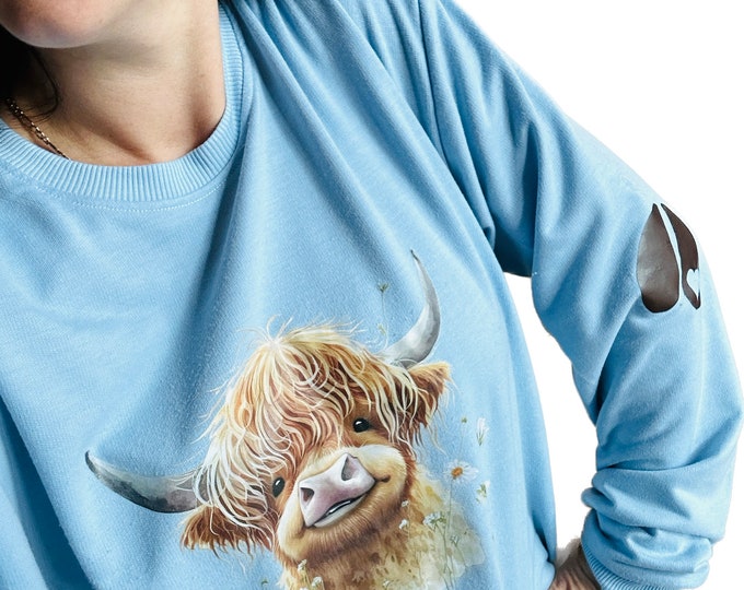 Highland Cow sweatshirt crewneck with heart Hooves on each elbow. For all parents grandparents mom dad grandma grandpa auntie uncle