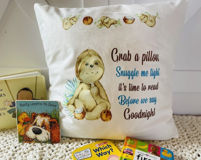 Pillow for children with a very cute sloth. Pillow says "Grab a pillow snuggle me tight, it's time to read before we say goodnight".