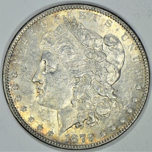 1879 Morgan Dollar; Choice AU-Unc.