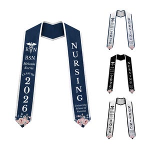 May include: Navy blue and white graduation sash with the word "NURSING" in white. The sash includes the text "BSN Melanie Norris Class of 2026" and a floral design. Several sashes are displayed.