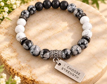 Ik kies voor kracht armband – Sneeuwvlokobsidiaan, howliet, lavasteen aromatherapie (18 cm)
