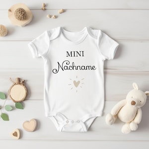 Pregnancy announce bodysuit.Pregnancy announcement bodysuit.Mini last name baby announcement.Baby 2024.Baby romper personalized.