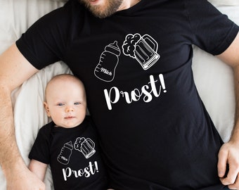 Cheers Family Festival: Matching Oktoberfest-inspired outfits for parents and children.Dad Baby T-Shirt Set.Family Outfit. Family clothing.