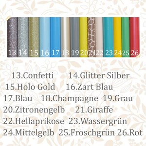 May include: A chart showing 13 different colors of vinyl with corresponding numbers and names. The colors include confetti, glitter silver, holo gold, light blue, blue, champagne, gray, lemon yellow, giraffe print, apricot, teal, lime green, and red.
