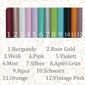 May include: Twelve color swatches, numbered 1 through 12, with corresponding names in German and English. The colors are burgundy, rose gold, white, pink, violet, mint, silver, apple green, aqua, black, orange, and vintage pink.