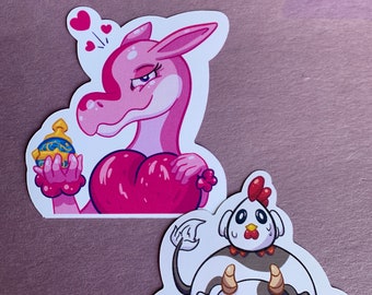 May include: Two stickers featuring cartoon characters. The first sticker is pink and features a pink dinosaur holding a heart and a golden orb. The second sticker is white and features a cow with a chicken on its back.