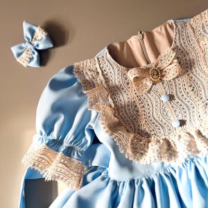 blue and tan lace dress Blue Zone | Lace V-Neck Three-Quarter Sleeve Dress main image 1