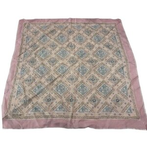 May include: A square scarf featuring a dusty pink border and a central pattern of repeating diamond shapes. Each diamond contains a light blue and tan floral motif set against a beige background, creating a symmetrical and geometric design.